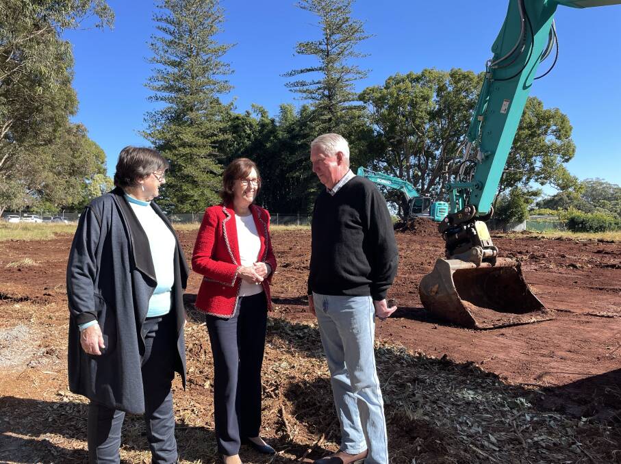 Port Macquarie Arts and Craft Centre president Mavourna Collits, Port Macquarie MP Leslie Williams and Oxley Vale Lifelong Learning Centre president Dennis Woods discuss the progress on the site. Photo: Lisa Tisdell