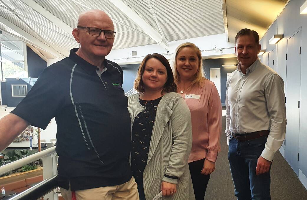 Working together: Endeavour Mental Health Recovery Clubhouse CEO Rob Moorehead, Endeavour Mental Health Recovery Clubhouse team leader Nicole McIntosh, Kelly Saidey from Lifeline Mid Coast and Nicholas Kosseris from the Mid North Coast Local Health District show how collaboration works.