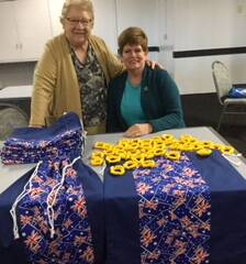 Lola Rinkin and Lyn Elliott pictured with the poppies and laundry bags for the Invictus Games.
