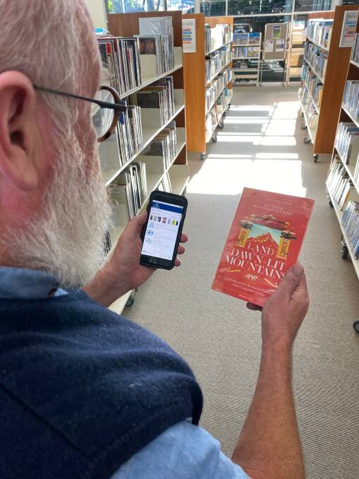 Helpful app: Library manager Jim Maguire encourages people to download the new library app.