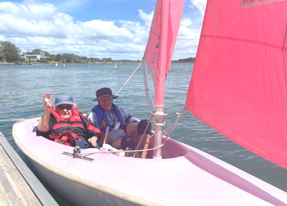 Special birthday: Centenarian Ohna Milanovic and Sailability Port Macquarie volunteer Bryce Taylor prepare to sail on the Hastings River.