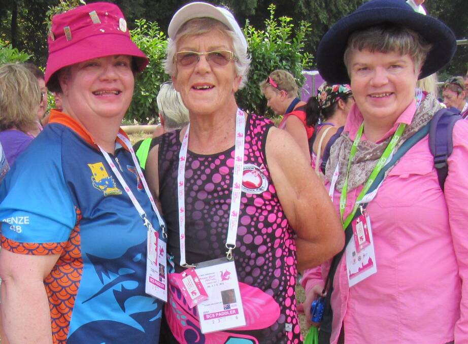 All smiles: Janet Kesby (centre), and her daughters Julie and Alison, support dragon boating.