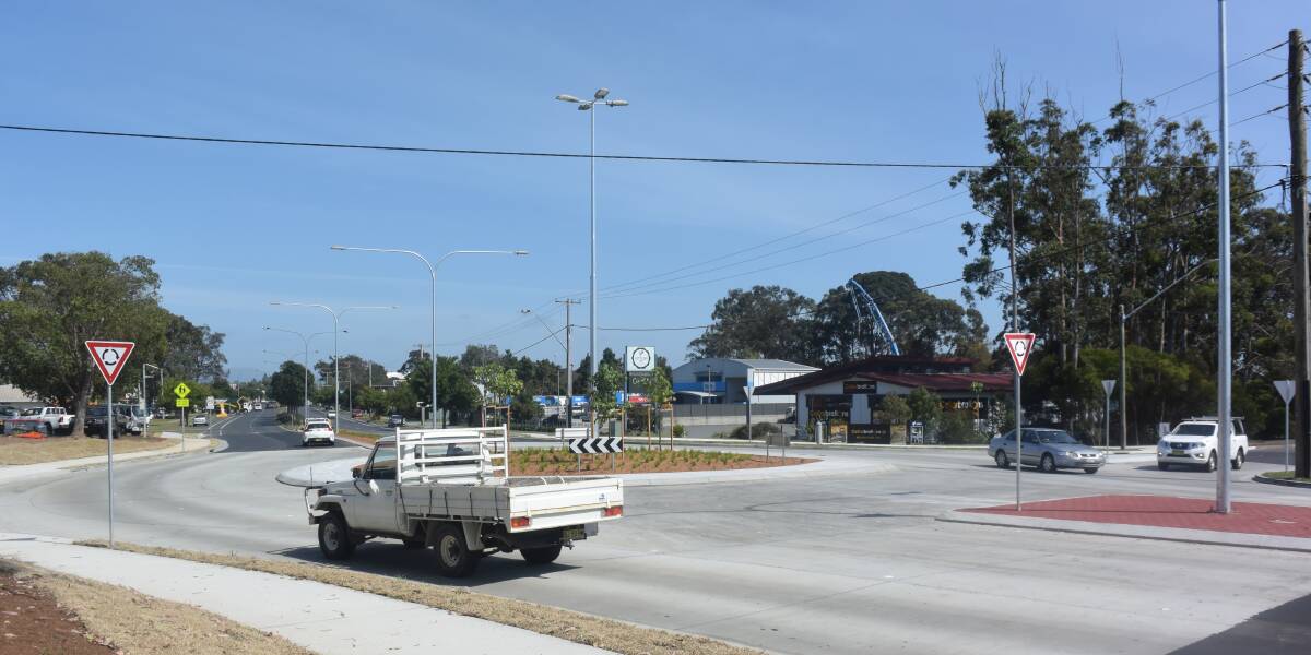 Upgraded intersection: Motorists negotiate the new roundabout at the intersection of Hastings River Drive and Newport Island Road.