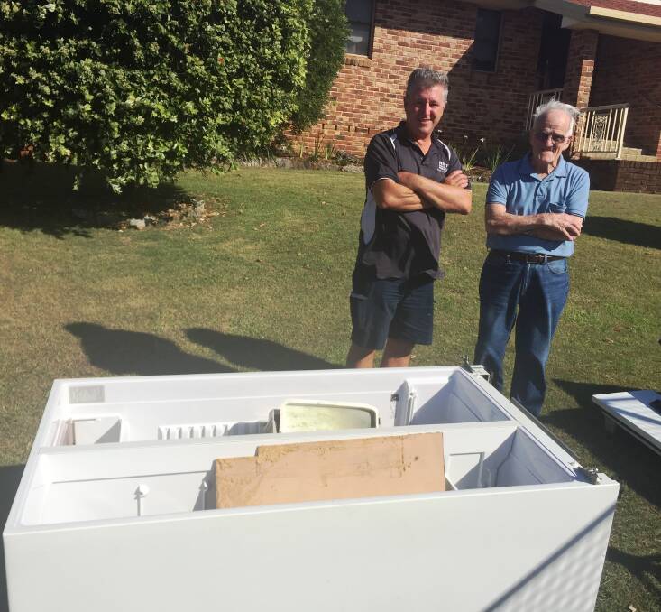 Unhappy: Business owner Frank Stramlic and his client Len Wagner with the fridge.