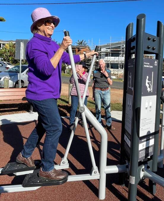 Anne Drinan exercises at the new outdoor gym at Rainbow Beach Reserve. Photo: Lisa Tisdell