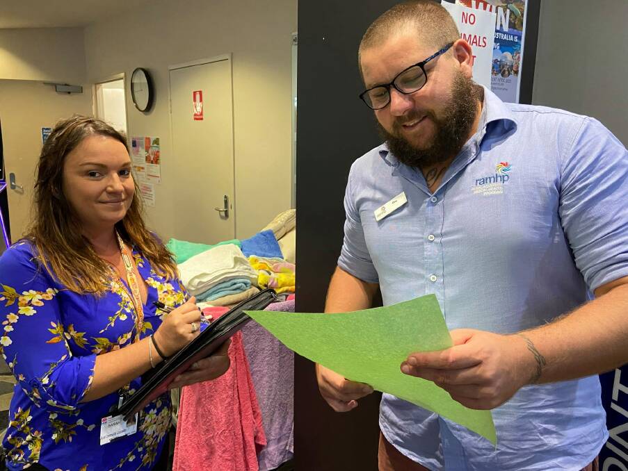 Experts in their field: Mental health community counsellor Sarah Mason and Rural Adversity Mental Health Program coordinator Orry Berry at the evacuation centre at Laurieton United Services Club. 