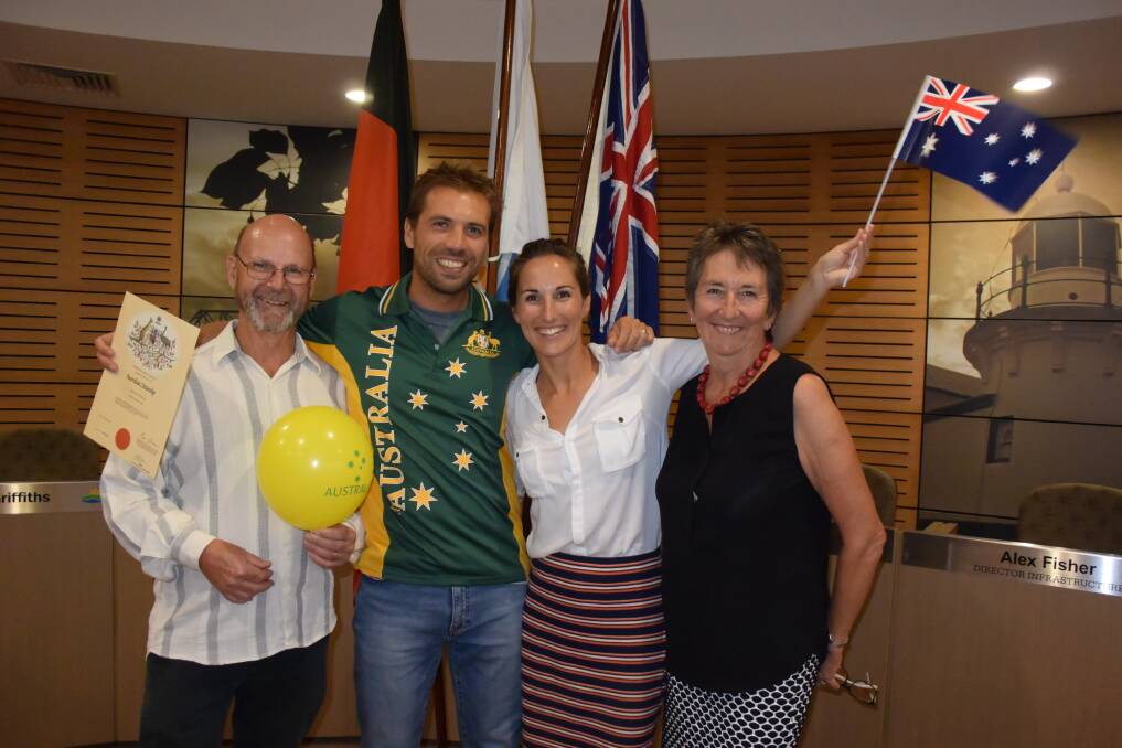 True blue: Andriy Boyko (second from left) celebrates becoming an Australian citizen with support from Leigh Schwartzkoff, Emma Schwartzkoff and Christine Schwartzkoff.