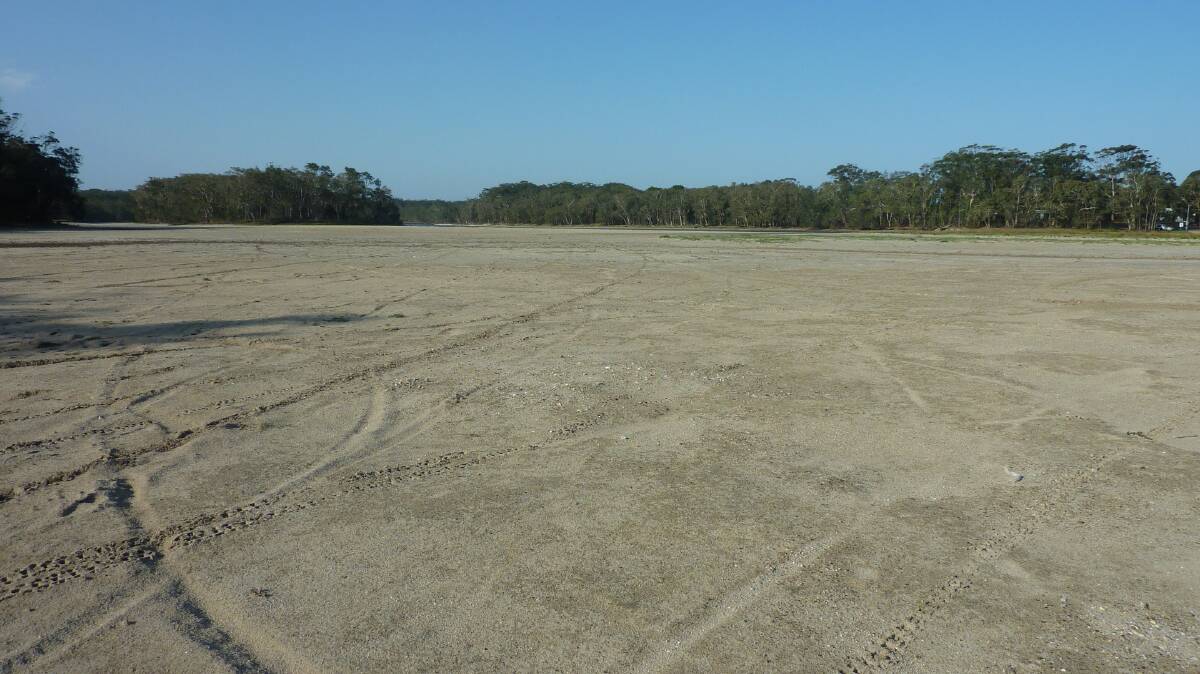 Drying up: Sand flats have formed at Lake Cathie as the water level drops.