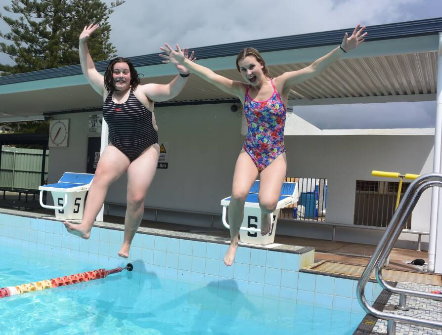 Jumping in: Georgia Gocentas and Sarah Bailey prepare to make a splash at the Port Macquarie pool.