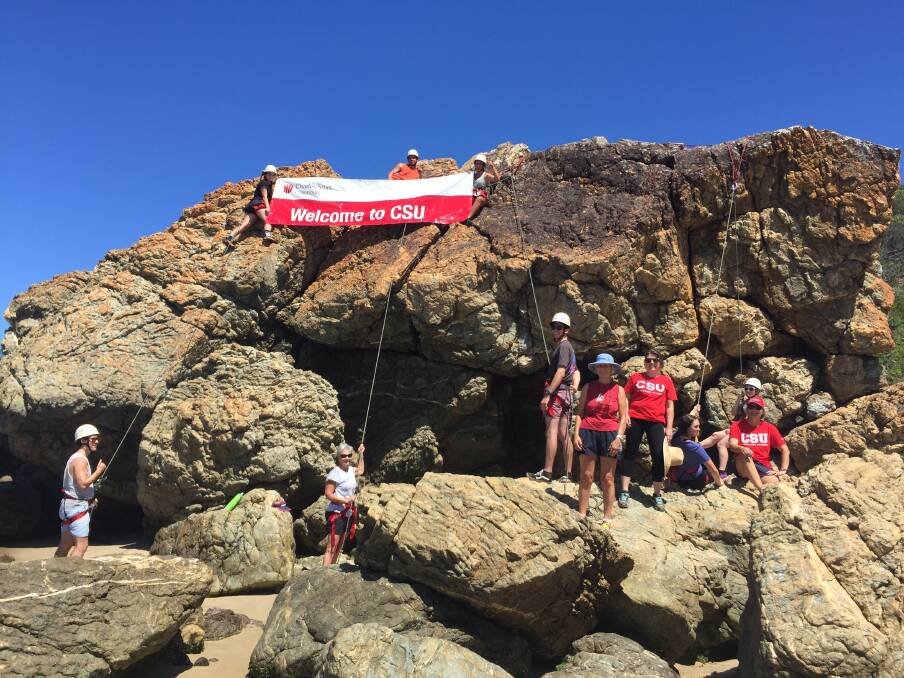 Outdoor adventure: Jake Combey, Teresa Cochrane, Sally Moriarty (lecturer), Zane Sparke, Elena Babazogli, Lochlan Hughes, Associate Professor Rosemary Black, Dr Prue Laidlaw, Lacey Cornall, Emily Kotwa and Janet Watson (lecturer) swap the CSU campus for rock climbing at Nobbys Beach.