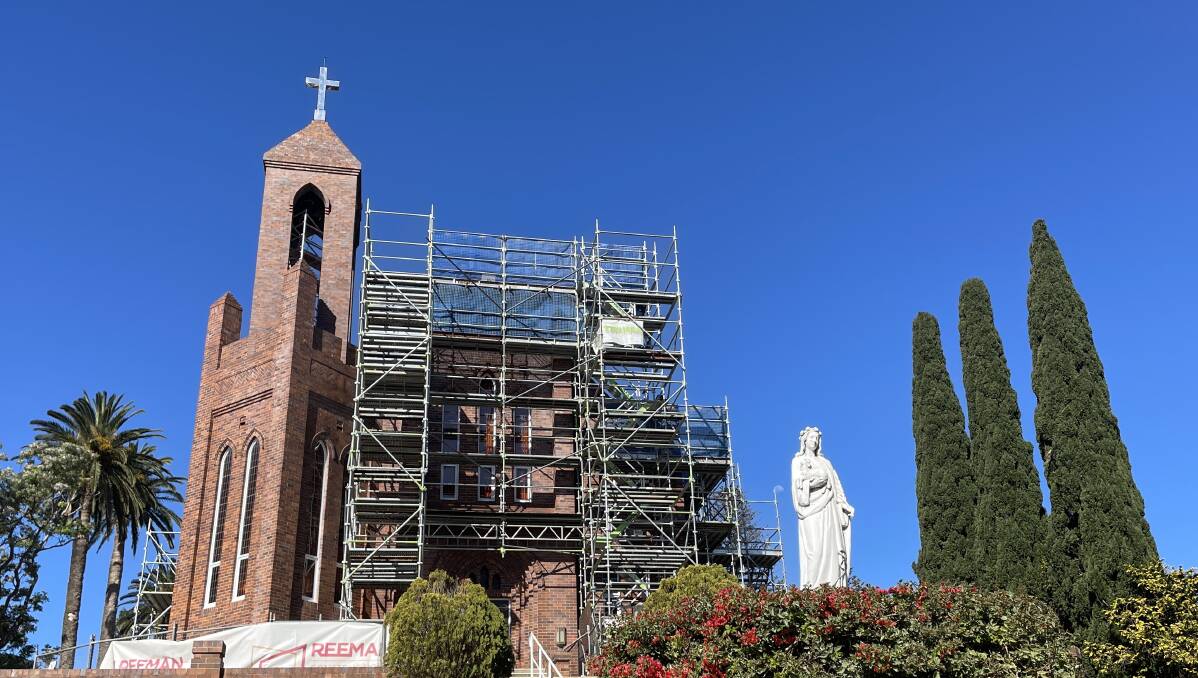 The roof replacement project is in progress at St Agnes' Catholic Church. Picture by Lisa Tisdell