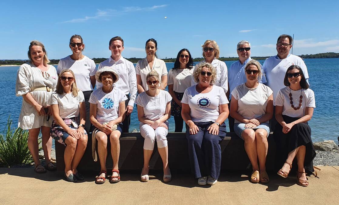 A group of supporters get ready for the Coastal Walk Against Domestic and Family Violence. Picture by Lisa Tisdell