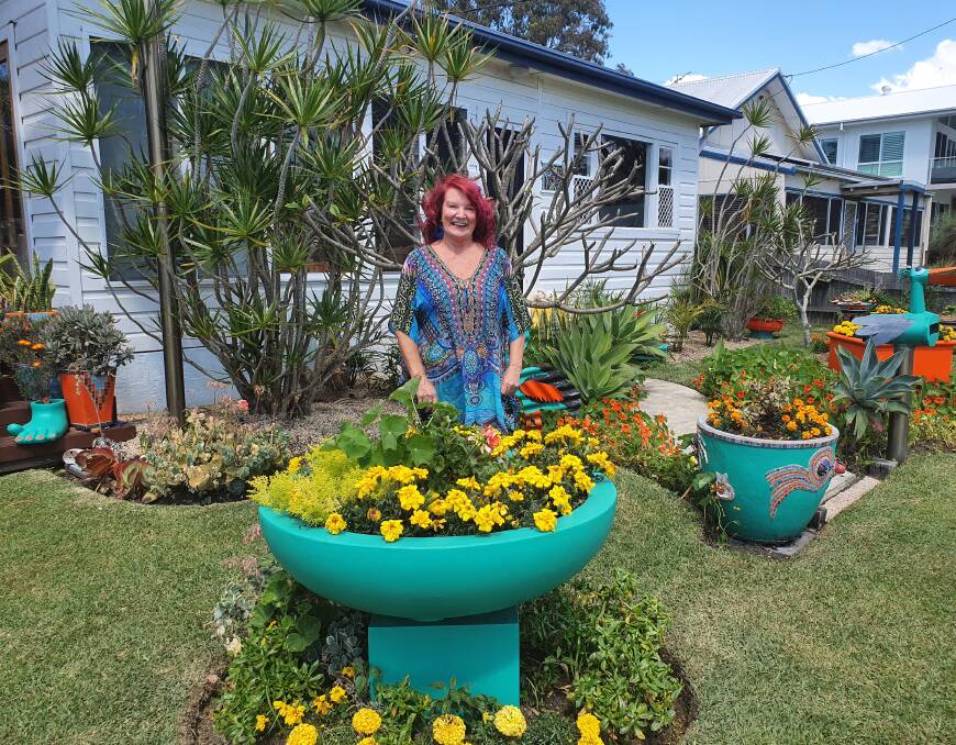 Bright and colourful: Wendy Smyth's love of colour is on show in her Dunbogan garden.