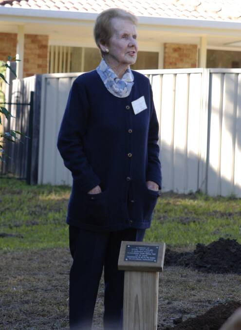 Cath Le Page speaks at a tree planting event in memory of Royal Pullen. Photo: Friends of Kooloonbung Creek Nature Park