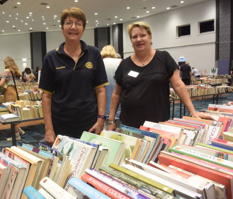 Fundraiser: Sandra Adams and Elizabeth Fielding from the Rotary Club of Port Macquarie help out at the Giant Book Sale.