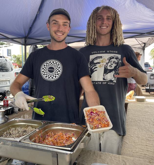 The Organic Factory's Cody Rogers and Taranar Sloan-Harris serve up organic and vegan meals at the Real Food Markets in Port Macquarie.
