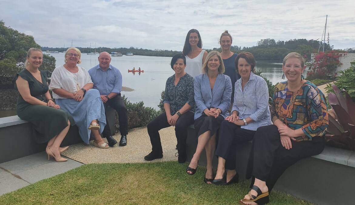 Scenic location: Louise Beaumont, Kelly Lamb, Terry Sara, Caron Dyball, Michelle Parker (back), Kelly King, Sandra Magann (back), MP Leslie Williams and Skye Petho look ahead to the International Women's Day garden party.