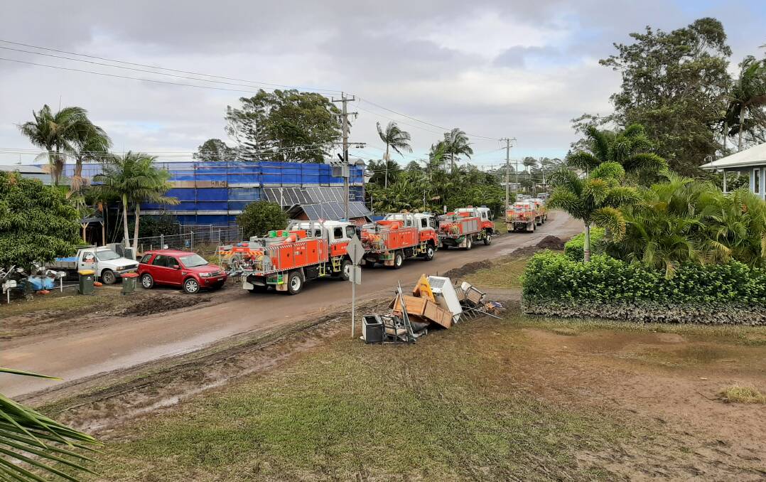 Flood aftermath: A line of fire trucks on the North Shore as part of the flood recovery effort.