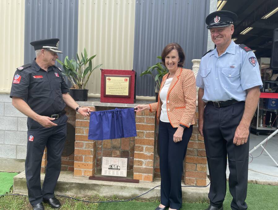 Fire and Rescue NSW Assistant Commissioner regional operations Rob McNeil and Port Macquarie MP Leslie Williams officially open the Mid North Coast Fire Museum as Mid North Coast Fire Restoration Group president Don Davidson looks on.