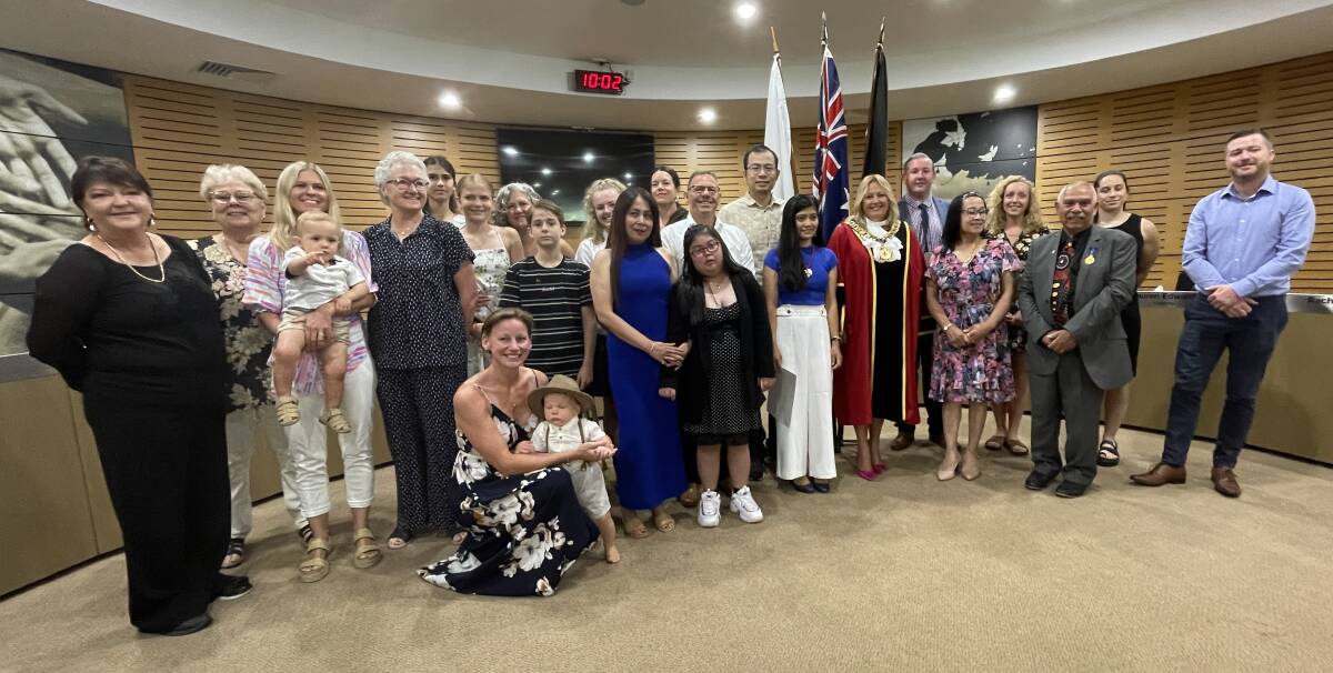 New Australian citizens, family members and officials at the first of two citizenship ceremonies on Thursday, November 24. Picture by Lisa Tisdell