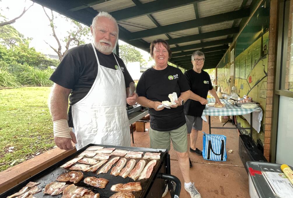 Make a Difference Port Macquarie volunteers Pete Navin, Terri Vogel and Liz Condon prepare breakfast for people doing it tough. Picture by Lisa Tisdell