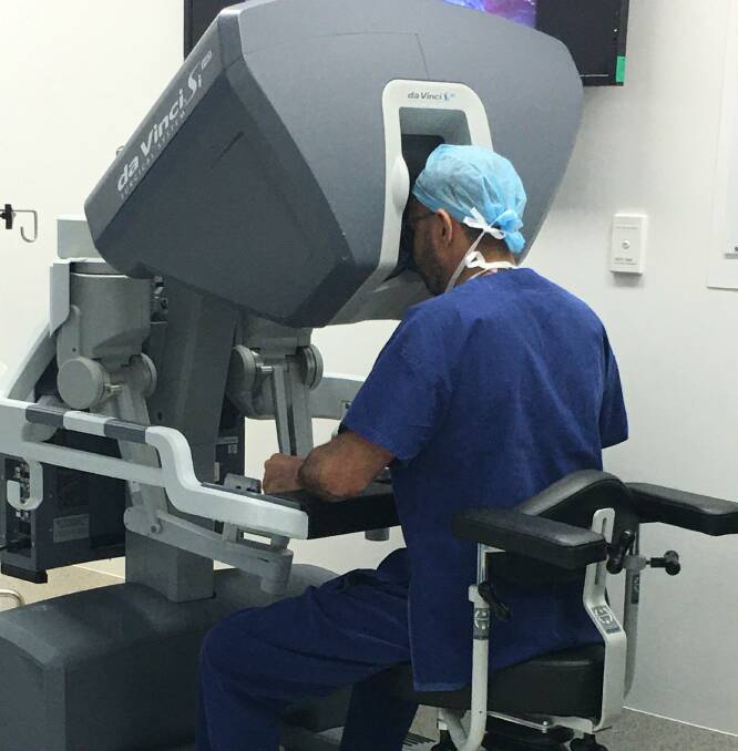 Latest technology: Urologist Dr Nader Awad performs a procedure using the robotic technology at Port Macquarie Private Hospital. Photo: Port Macquarie Private Hospital