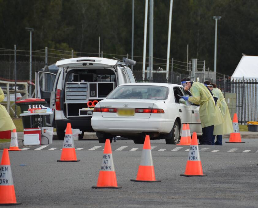 Testing site: The Port Macquarie COVID-19 drive-through testing clinic in operation at Port Macquarie Regional Stadium.