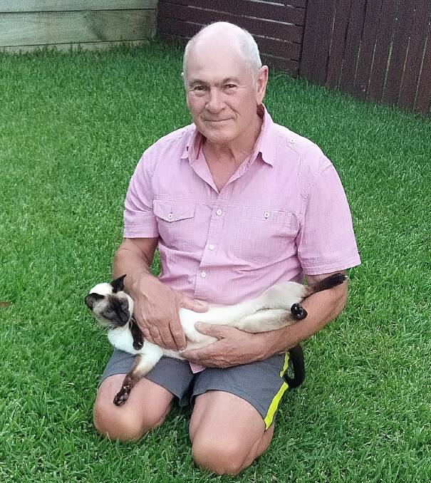 Health measure: Port Macquarie's Bob Knuckey, pictured with his cat Peggy, had no qualms about getting the AstraZeneca vaccine.