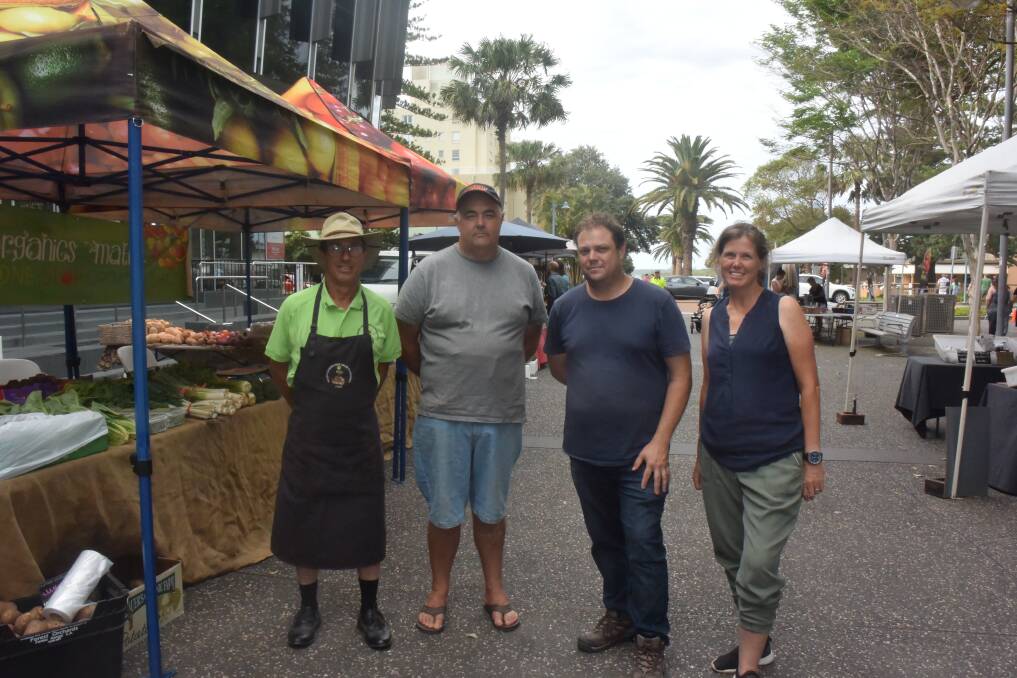 Voicing concerns: Stallholders Fred Sidler, Ian McKittrick, Michael Kendon and Desley Bailey are worried about the impact of the council's Markets Policy on the Real Food Markets.