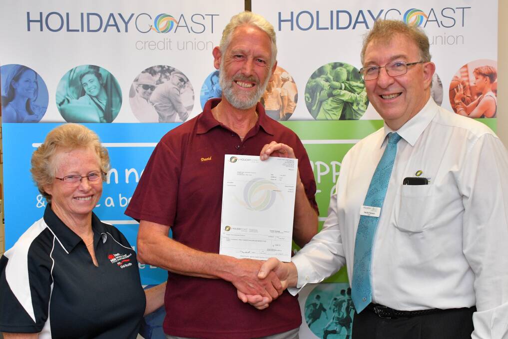 Sense of community: Jenny and David Horn from Douglas Vale thank Holiday Coast Credit Union CEO Neville Parsons.