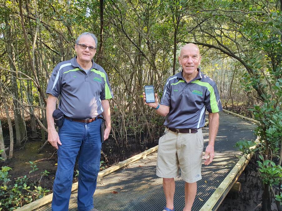 Natural environment: Friends of Kooloonbung Creek Nature Park coordinator Rex Moir and volunteer Gordon Robison encourage people to use the interactive audio walking tour map.