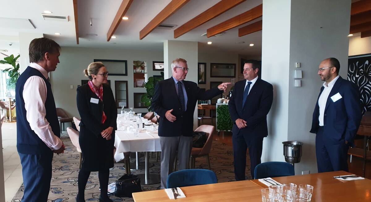 Health in focus: Regional Health Minister Mark Coulton (centre) speaks with Mid North Coast Local Health District chief executive Stewart Dowrick, Port Macquarie Private Hospital chief executive officer Connie Porter, Cowper MP Pat Conaghan and urologist Dr Nader Awad.
