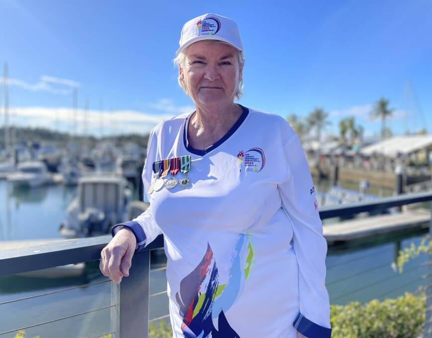 Torchbearer Lyn Bye will wear her late husband's medals when she takes part in the Legacy Centenary Torch Relay. Picture by Lisa Tisdell