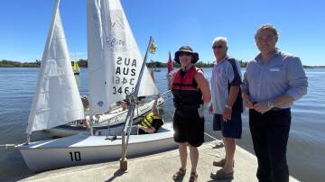 Kathryn Stephens, Wayne Evans and David Gearing are pleased with Sailability Port Macquarie's new boat.