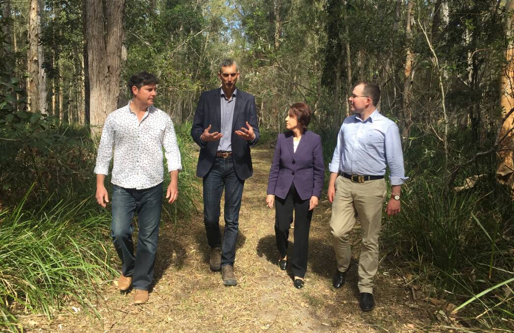 Good step: Property owner Scott Castle, Invasive Species Council CEO Andrew Cox, Port Macquarie MP Leslie Williams and Agriculture Minister Adam Marshall talk about the measure to help control the feral deer population.