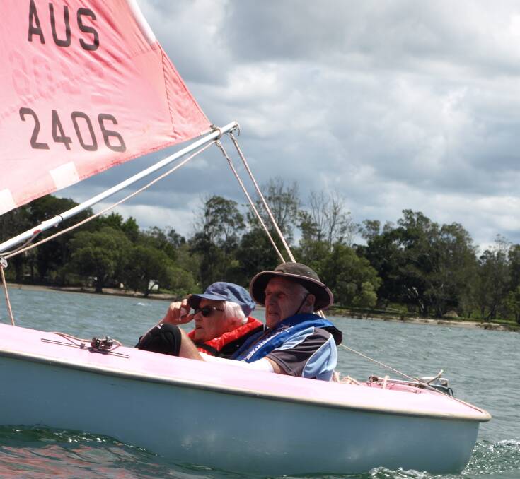 Centenarian Ohna Milanovic and Sailability Port Macquarie volunteer Bryce Taylor sail on the river. Photo: Lloyd Cross