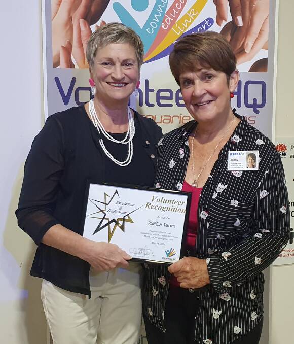 Thank you: Port Macquarie Volunteer Branch RSPCA president Jackianne Wright and volunteer shop coordinator Jenny Bucton display the RSPCA team's volunteer recognition certificate.
