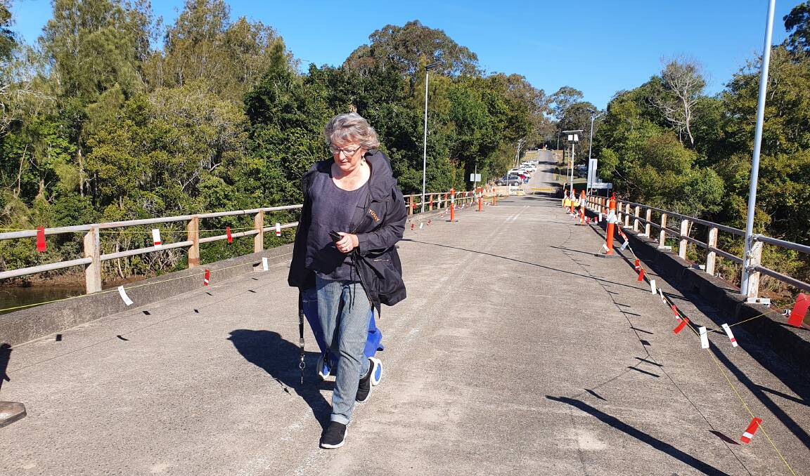 Necessary path: Pauline Chapman walks across Rawdon Island bridge.