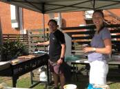 Andrew Mitchell and Tasha Reid fire up the barbecue.
