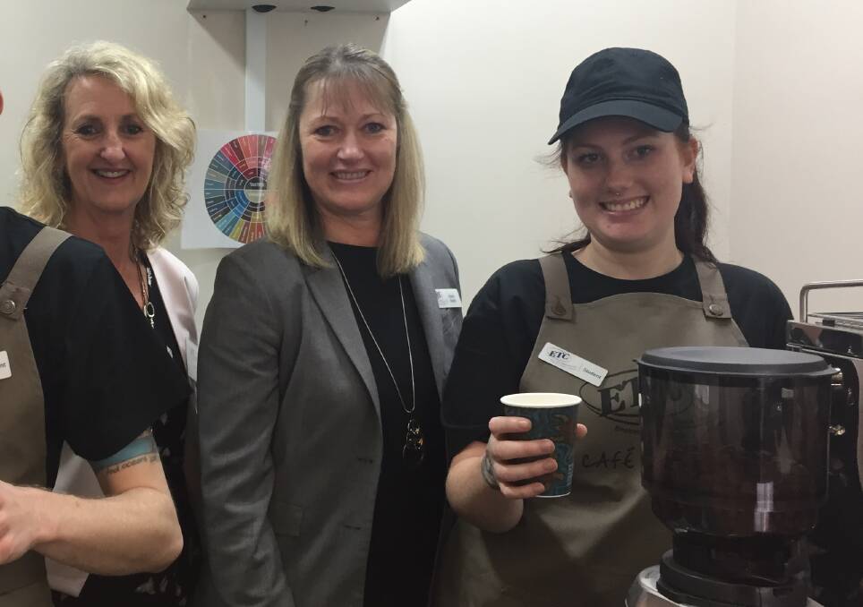 Practical skills: Hospitality student Laura Donohoe (right) hones her barista skills as ETC chief executive officer Jenny Barnett and general manager training Karen Busby look on.