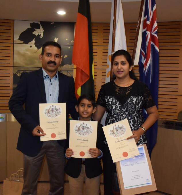 Biju Jose, Aaron Biju and Anice John are proud new Australian citizens.
