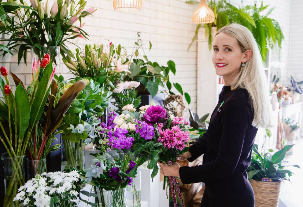 Touchwood Flowers owner Ashley Sargeson says it is an honour to win the merchandising and branding category of the Sydney Markets Fresh Awards. Photo: Supplied by Sydney Markets Fresh Awards