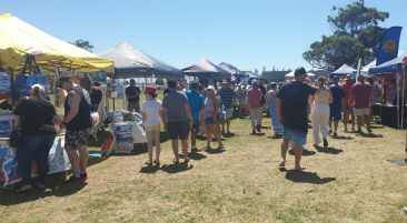 Out and about: Community members support the market stalls as part of Hastings Summer Waves on Australia Day. Photo: Greg Davies