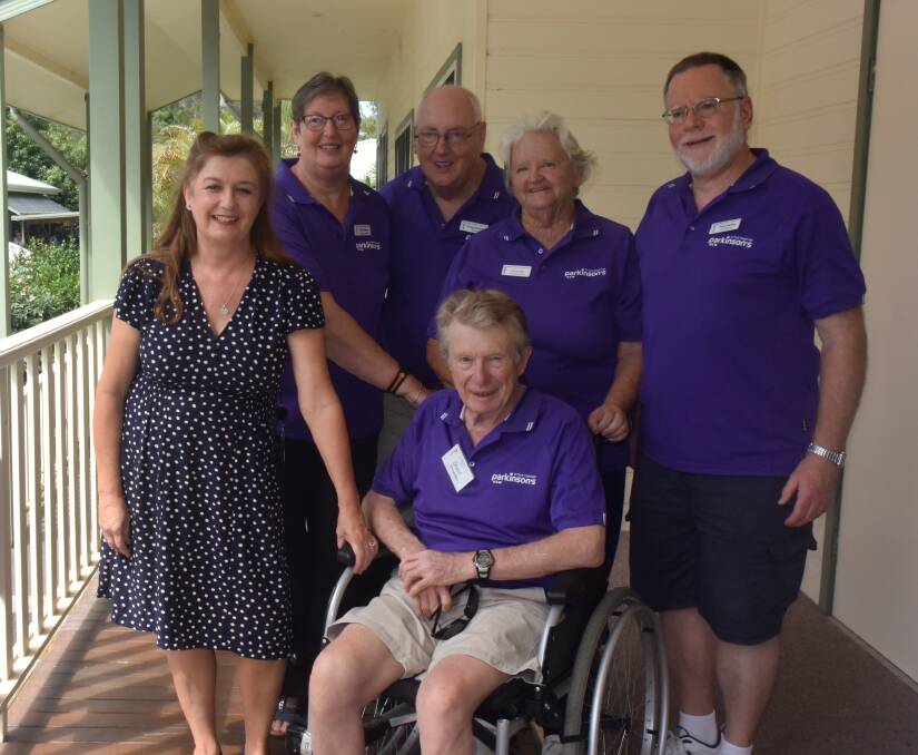 Health and education focus: Specialist neurological nurse Rachael Mackinnon chats with Port Macquarie  Parkinson's Support Group assistant secretary Sue Faulkner, president Gregg Faulkner, welfare officer Jenny Wall, vice-president Peter Fienieg and (front) member Stuart Snowden.