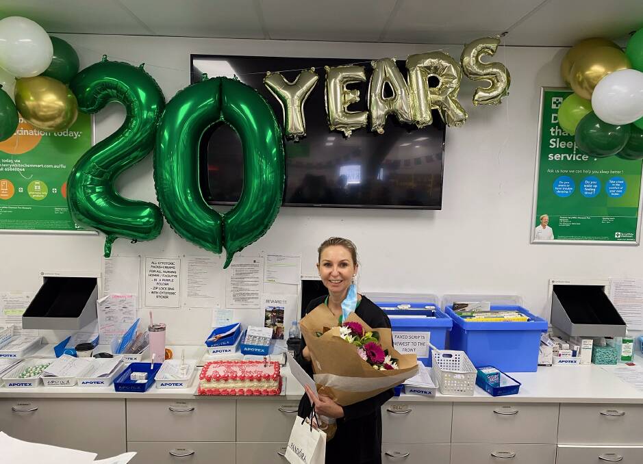 Rewarding career: Retail manager Jo Martin celebrates 20 years at Plunkett's Pharmacy.