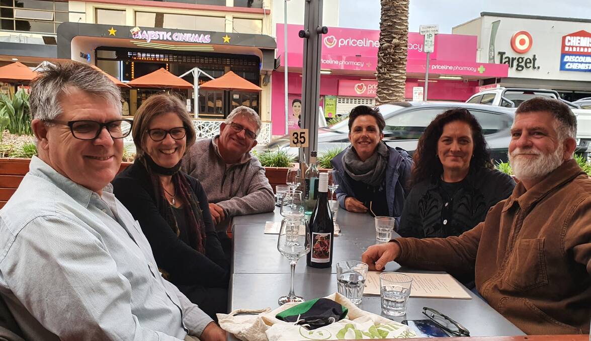 Dinner time: Steven, Adele, Brad, Michele, Helen and Grant Miles enjoy outdoor dining at Reyhana Turkish Restaurant. The restaurant has one of two outdoor dining parklets in the CBD.