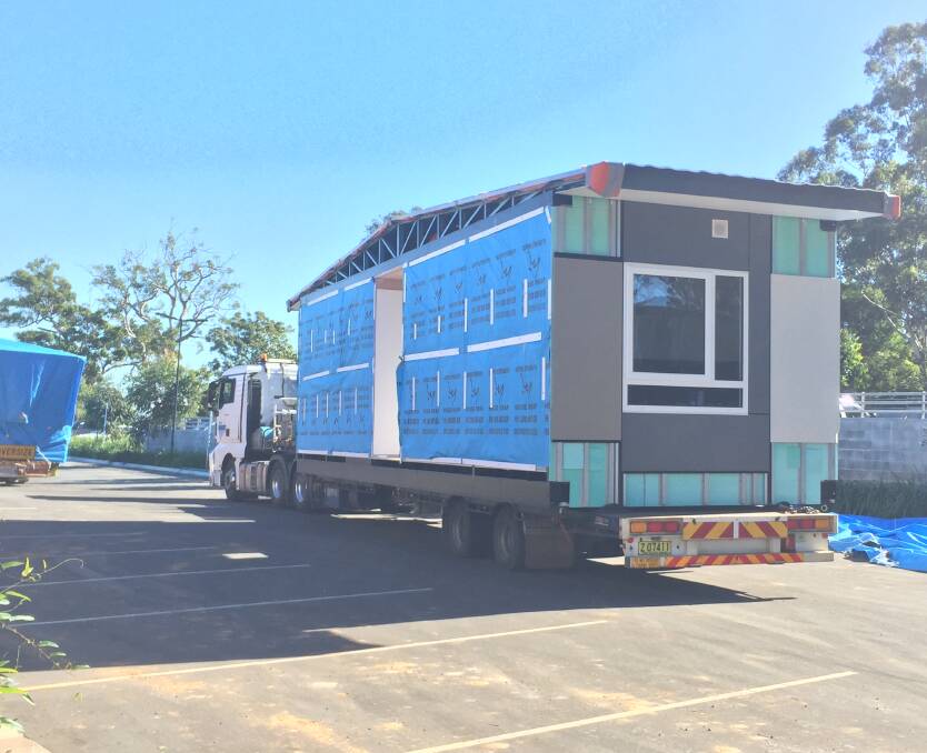 Building process: A module or pod arrives at Charles Sturt University Port Macquarie.