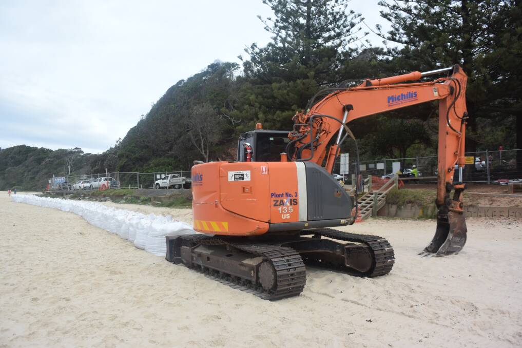 Improvements on the way: A new seawall is under construction at Flynns Beach.