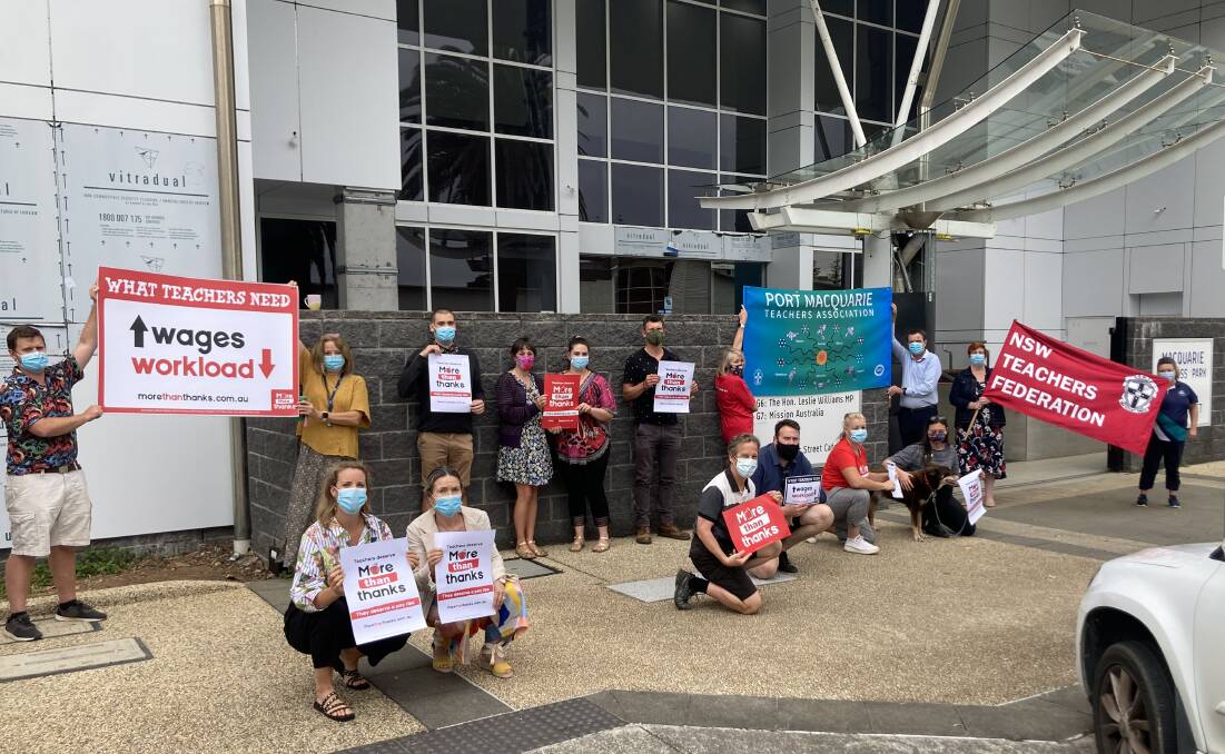 More than thanks: Port Macquarie Teachers Association representatives stage a demonstration in support of a solution to the workload and salary issues they say deter people from joining the profession.
