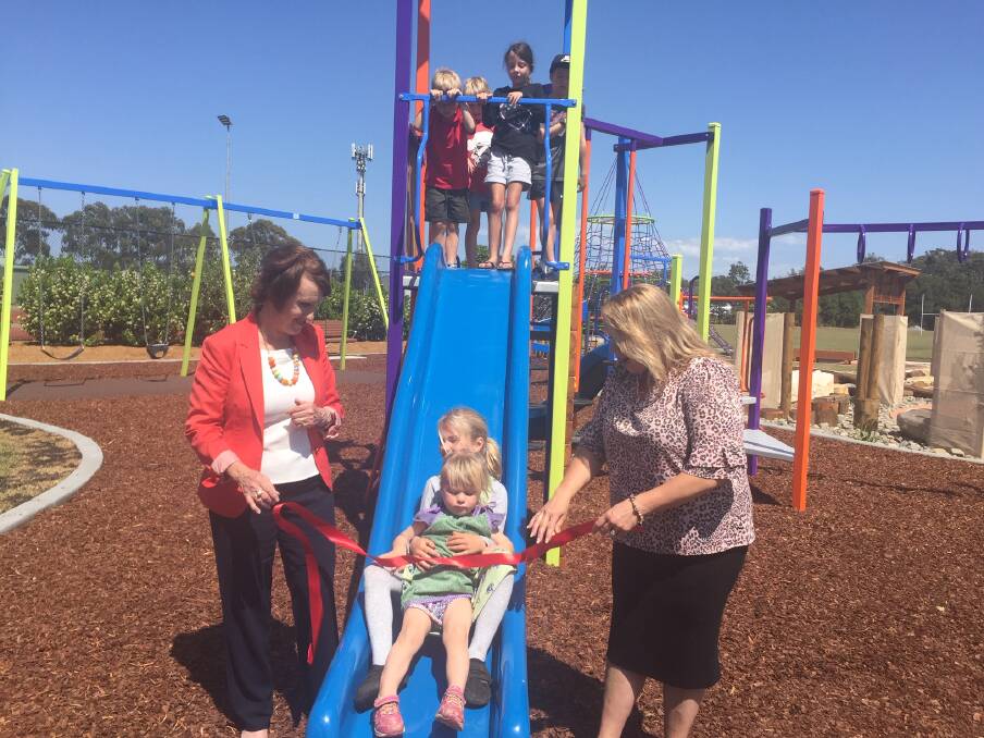 Port Macquarie MP Leslie Williams and mayor Peta Pinson officially open the Stuart Park upgrades with assistance from youngsters at the playground.